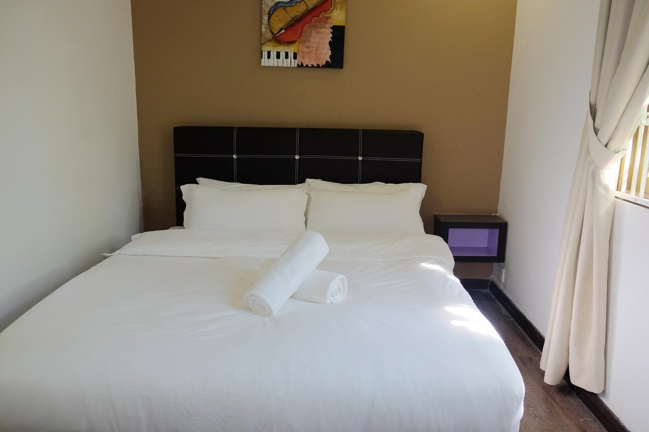 Natol Homestay - London Kuching Bagian luar foto